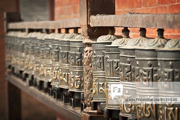 Prayer Wheels around Swayambhunath to gain merit  Kathmandu  Nepal