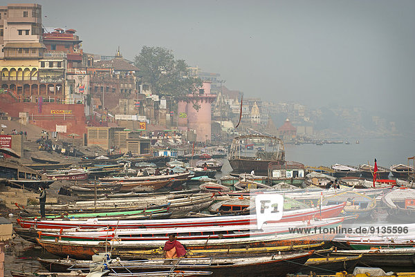 Many boats along the banks of the Ganges River  Varanasi India
