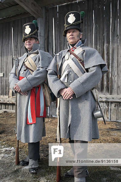 Men dressed as British soldiers  in period costume  Festival du Voyageur  Winnipeg  Manitoba  Canada