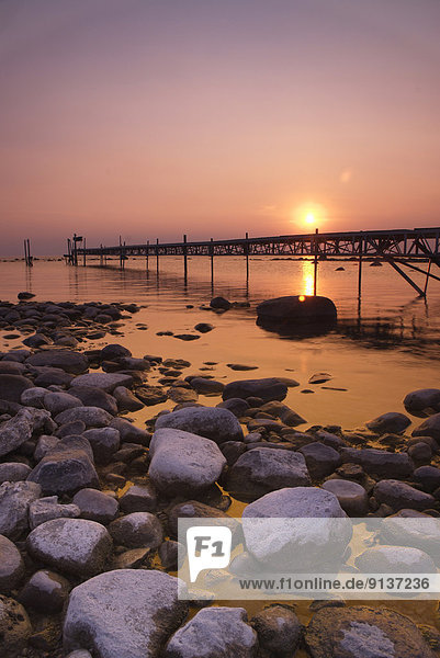 Pier with sunset near Woodland Beach  Georgian Bay  Ontario