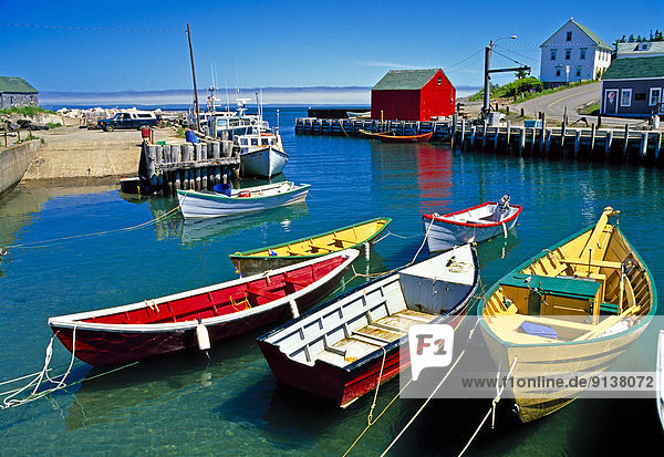 Small wooden boats at Halls Harbor  Bay of Fundy  Nova Scotia  Canada