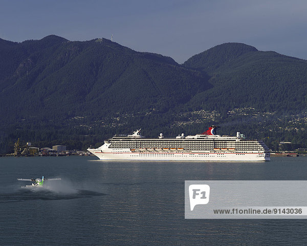 Cruise ship and seaplane  Burrard Inlet  Vancouver  British Columbia  Canada