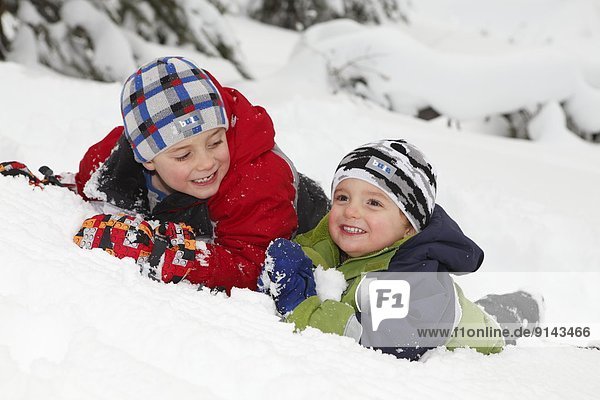 2 young boys in snow at Silver Star Provincial Park  near Vernon  Okanagan  British Columbia  Canada