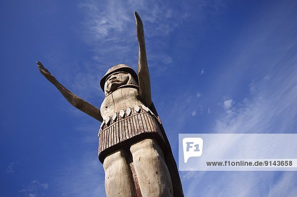 First Nations statue in Ambleside Park and the West Vancouver Centennial Seawalk  West Vancouver  British Columbia  Canada