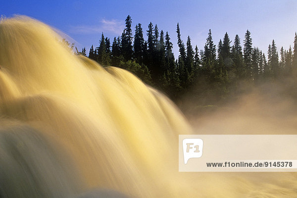 water tumbles over Pisew Falls  Pisew Falls Provincial Park  Manitoba  Canada