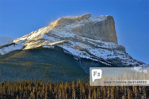 A horizontal winter image of Roche Miette mountain in Jasper National Park Alberta Canada.