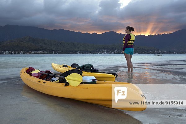 Kayaker on the Sunken Sandbar at Sunset  Kane'ohe Bay  Oahu  Hawai'i  United States of America