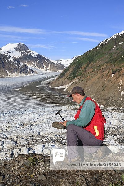 Geologist exploring for minerals  Salmon Glacier area  Stewart  British Columbia
