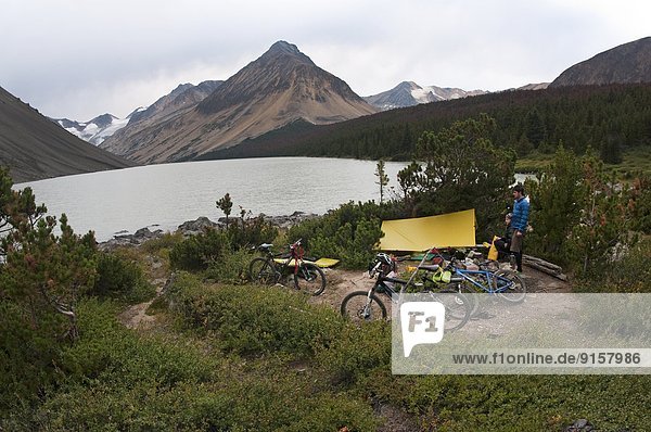 Camp at Lorna Lake. Mountain bike touring in Spruce Lake Protected Area. South Chilcotin Mountains. British Columbia Canada