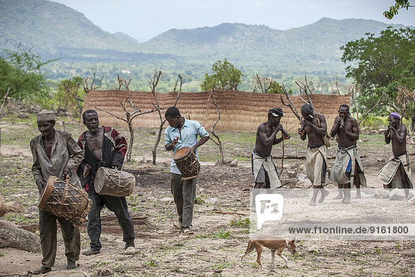 Men of the Koma people with instruments  the animistic people live in the Alantika Mountains  Wangai  North Region  Cameroon
