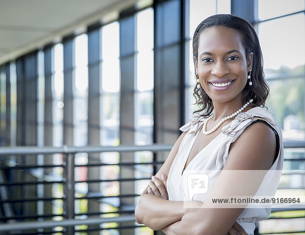 Black businesswoman smiling outdoors