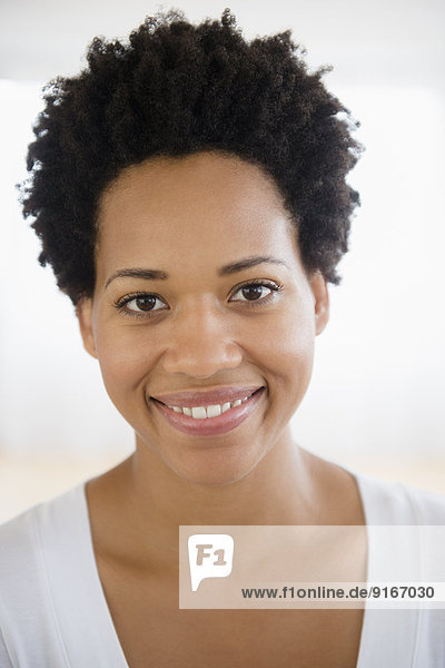 Close up portrait of smiling Black woman