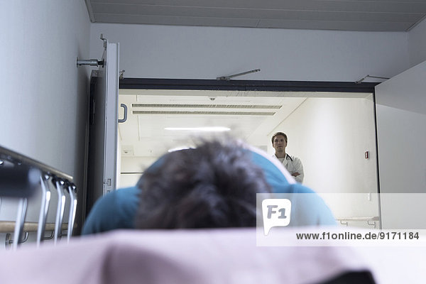 Germany  Freiburg  Doctor in hospital watching patient
