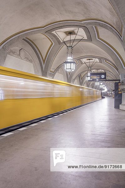 Germany  Berlin  historic subway station Heidelberger Platz with moving underground train