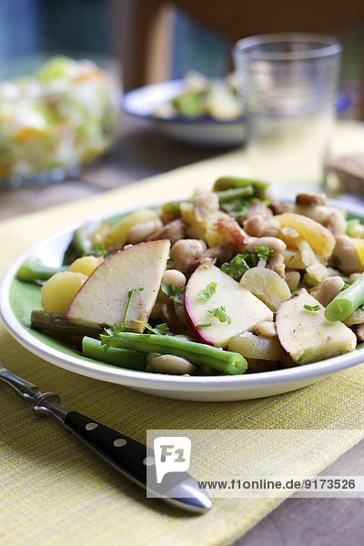 Westphalian blind hen  Traditional Westphalian stew with potatoes  white beans  green beans  apple  pear and tempeh