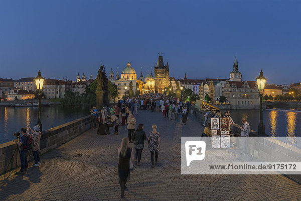 Czech Republic  Prague  People on Charles Bridge in the evening