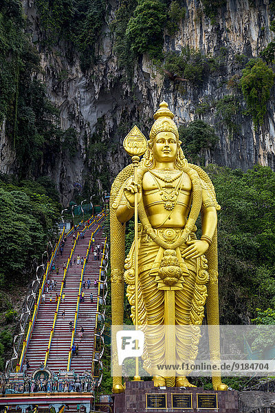 Gold Statue Of Murugan Outside Batu Caves Kuala Lumpur Selangor Malaysia