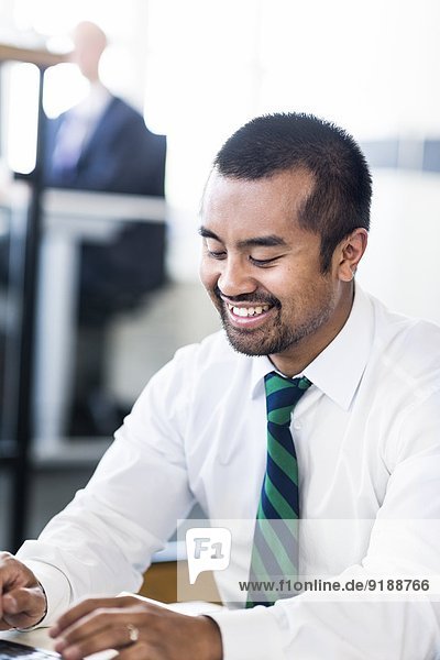 Mid adult businessman in office