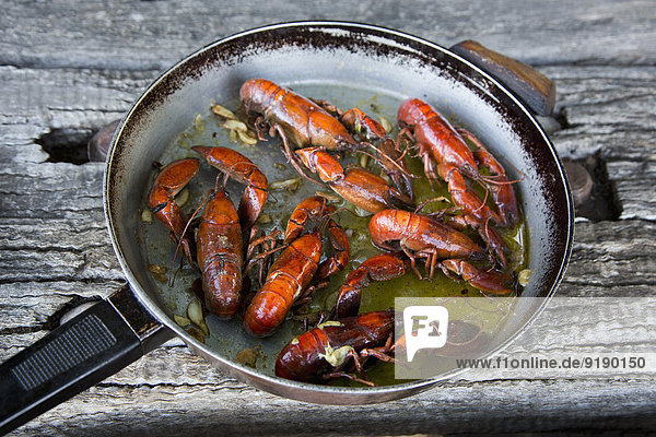 High angle view of crayfish in frying pan