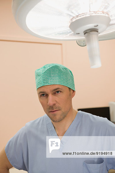 Male surgeon in an operating room