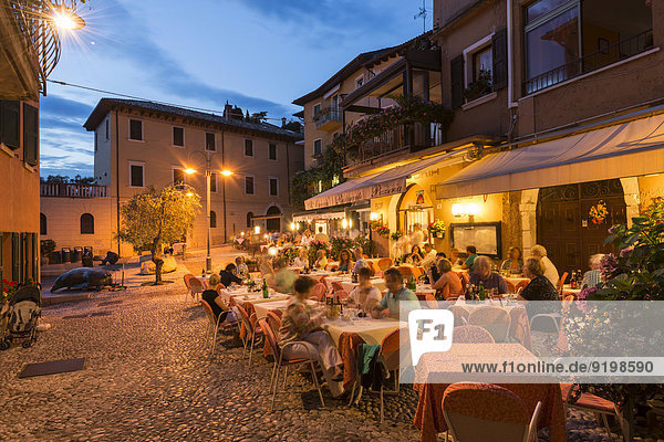 Restaurant in the evening  Malcesine  Verona province  Veneto  Italy