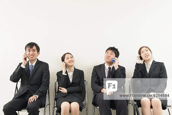 Japanese business people in waiting room