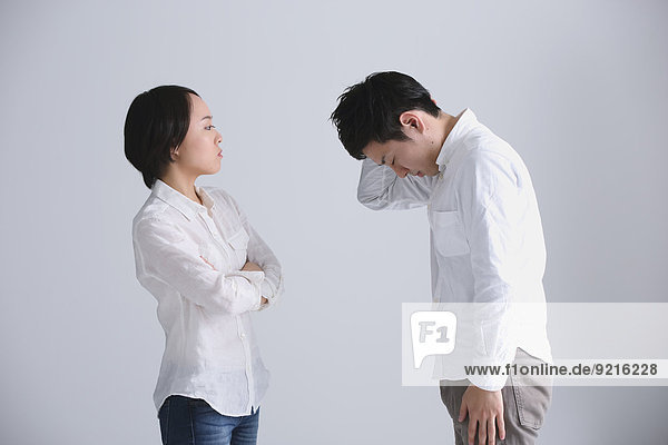Young Japanese couple having an argument