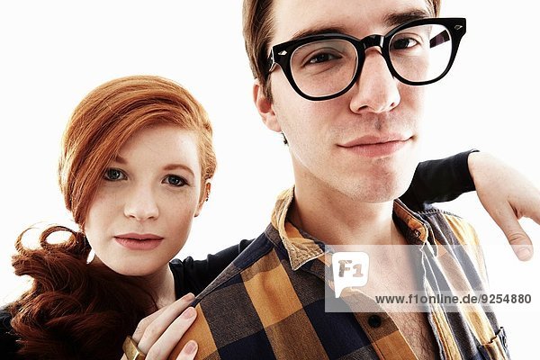 Studio portrait of cool young couple