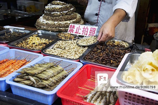 Maggots at a market (Lijiang  China)