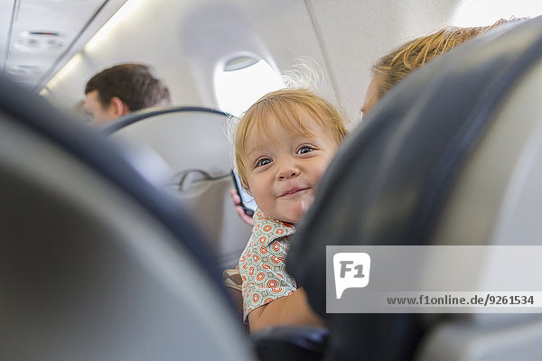 Flugzeug Europäer lachen Baby