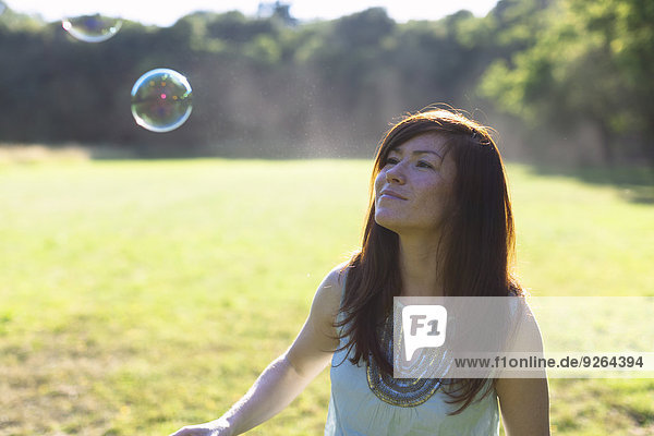 Woman with soap bubbles