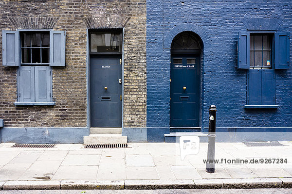 UK  London  Whitechapel  entrances and windows of two houses