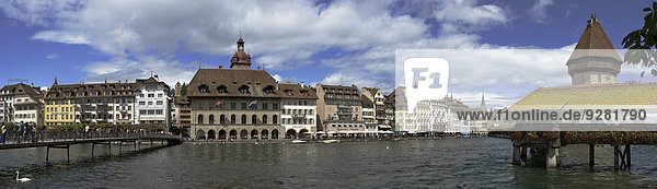 Panorama of Reuss promenade with Pfister Guildhall  Town Hall  Kapellbrücke bridge  Lucerne  Switzerland