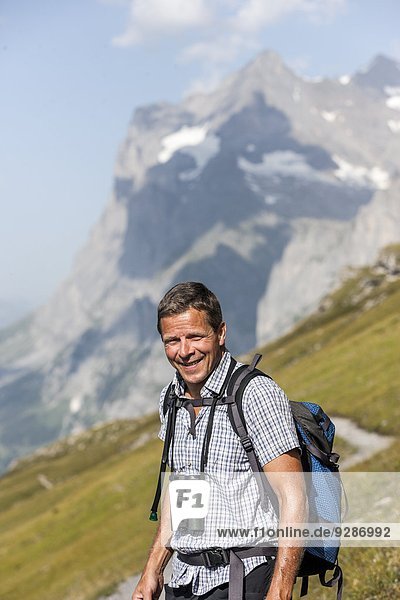 Smiling man hiking