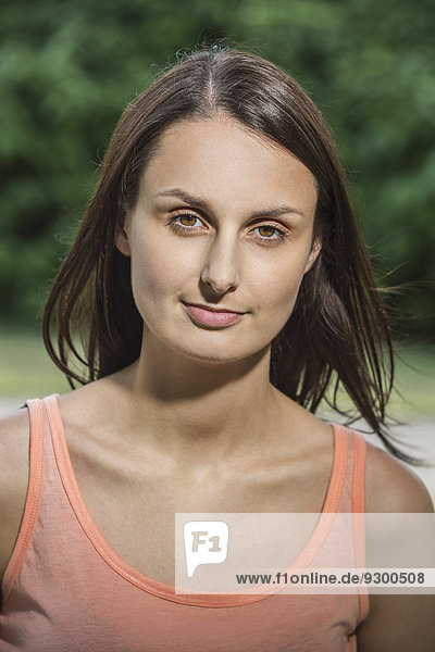 Portrait of confident woman in park
