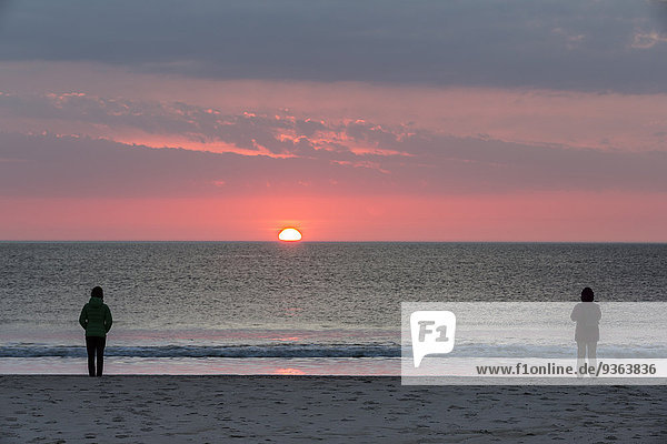 Germany  Schleswig-Holstein  Sylt  sunset on the beach  two people