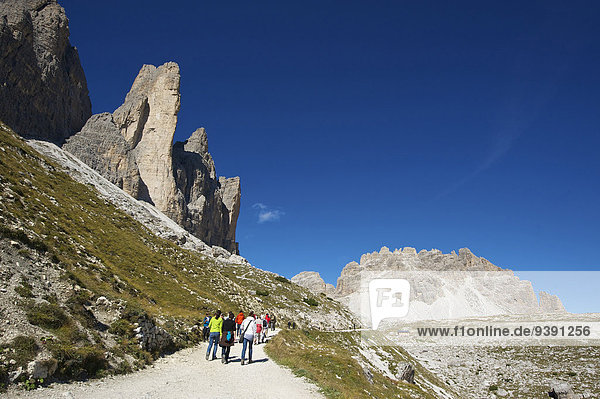 Italy  Europe  Trentino  South Tirol  South Tyrol  outside  Dolomites  mountains  mountain  landscape  mountainous  scenery  landscape  nature  day  hiker  activity  active  leisure  spare time  hobby  person  persons  people  Outdoor  sport  sporty  walk  hiking  Sextener Dolomites