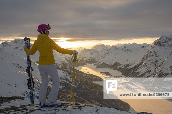 Corvatsch  skier  sundown  sunset  Upper Engadine  canton  GR  Graubünden  Grisons  Upper Engadine  mountain  mountains  winters  Switzerland  Europe  woman
