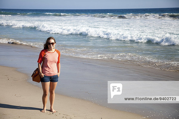 Woman on California beach.