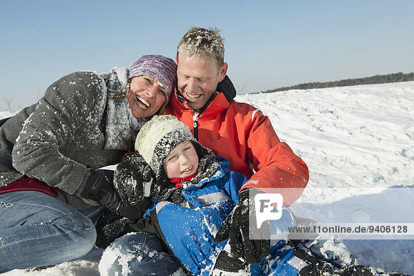 Family in winter  smiling