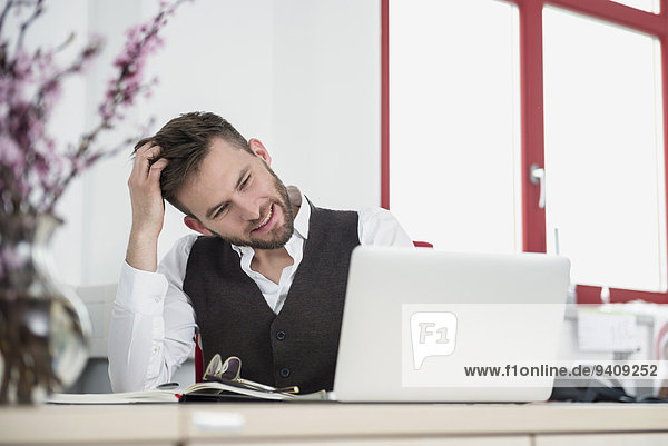 Young man office stress problem computer