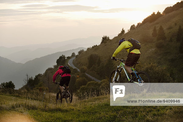 two mountain bikers on the way  Kolovrat  Istria  Slovenia