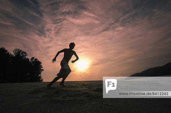 Strand Junge - Person Sonnenuntergang rennen Koh Lipe