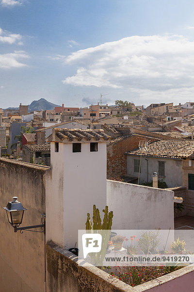 View from the city walls on the roofs of the historic centre  Alcudia  Majorca  Balearic Islands  Spain