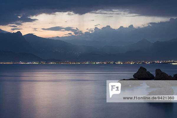 Evening mood by the sea  the Taurus Mountains at the back  Gulf of Antalya  Turkish Riviera  Turkey