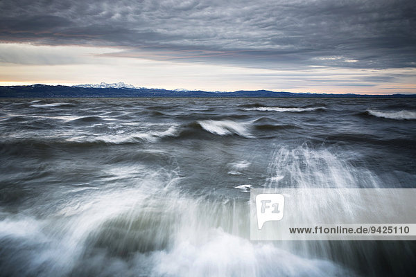 Winter storm on Lake Constance with a view towards the Alps  Langenargen  Baden-Württemberg  Germany