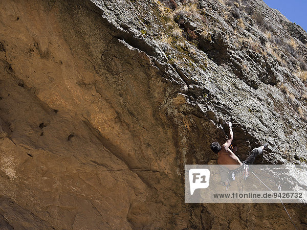 Free climber on a ridge  Cordillera Real  La Paz  Bolivia