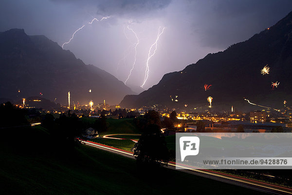 Fireworks and a summer thunderstorm  Swiss National Holiday on the 1st August  Canton of Glarus  Switzerland  Europe