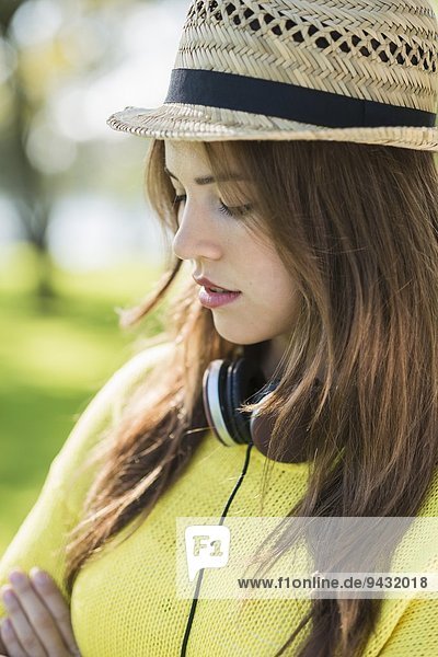 Young woman wearing straw hat  portrait