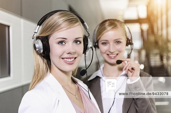 Call centre team wearing headsets